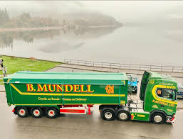 B Mundell truck at a coastal depot